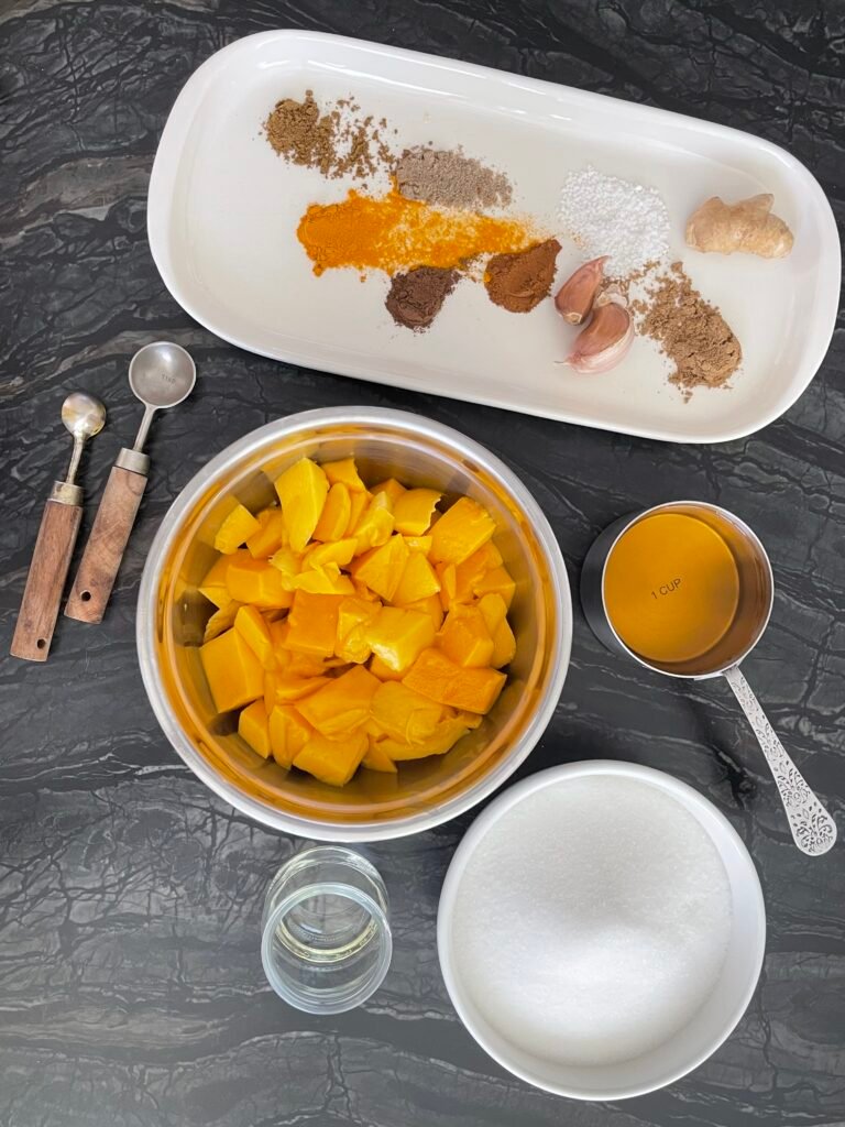 smooth mango chutney -  recipe ingredients gathered on the table