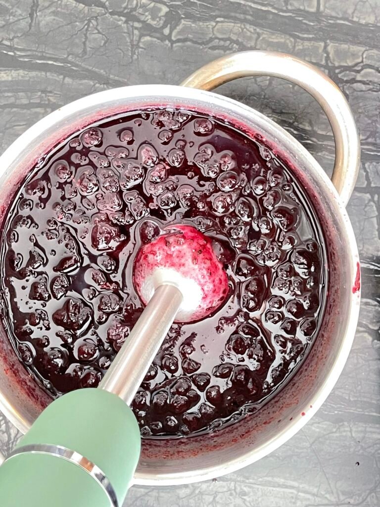 Making Blueberry Orange Jam — blending the jam with an immersion blender