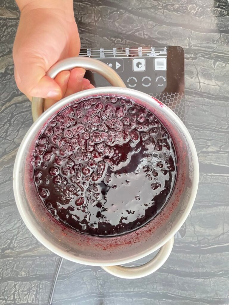 Making Blueberry Orange Jam — quick cook to soften blueberries before mashing